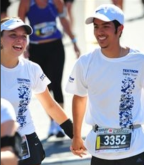 Alain and I cross the finish line hand in hand