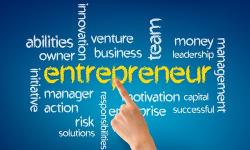 Hand pointing at a Entrepreneur word illustration on blue background.